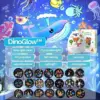 DinoGlow™ proiettore LED a forma di uovo di dinosauro con 21 temi